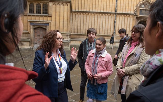 Tour guide and visitors at the Bodleian Libraries