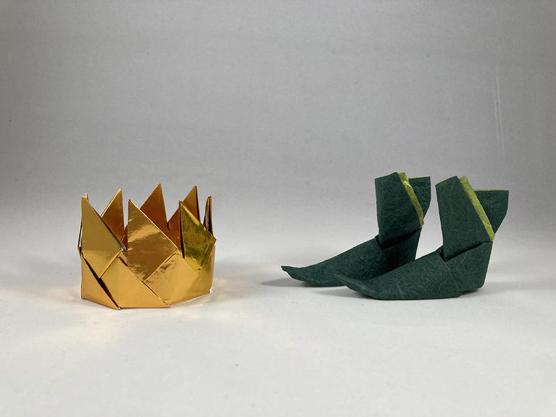 Locke Unlocked: Personal identity A gold crown to the left and a pair of green boots to the right - both made from paper